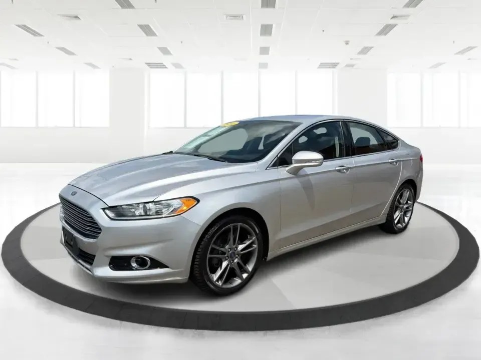 2014 Ford Fusion Titanium AWD (3FA6P0D98ER) with an 2.0L L4 DOHC 16V engine, located at 1099 N County Rd 25A, Troy, OH, 45373, (937) 908-9800, 40.057079, -84.212883 - Need a smart, comfortable sedan that can handle Ohio's changing weather for daily commuting, school drop-offs, and weekend getaways? This 2014 Ford Fusion Titanium AWD is built for real life in and around Troy-whether you're cruising down I75 to Dayton, heading across town on N County Rd 25A, or pla- Photo#8