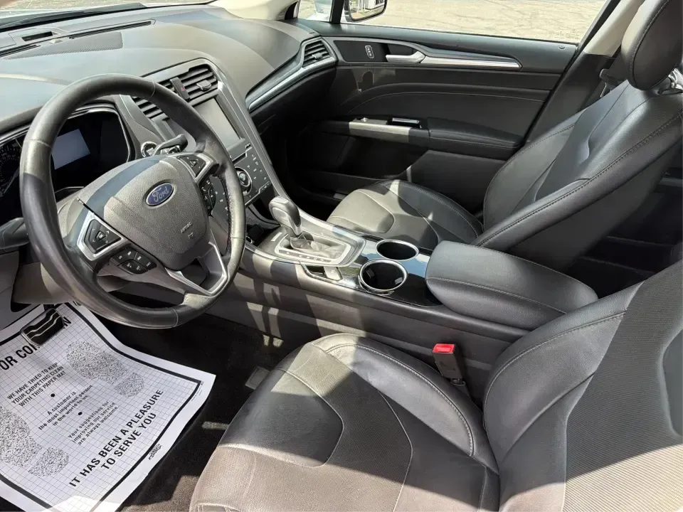 2014 Ford Fusion Titanium AWD (3FA6P0D98ER) with an 2.0L L4 DOHC 16V engine, located at 1099 N County Rd 25A, Troy, OH, 45373, (937) 908-9800, 40.057079, -84.212883 - Need a smart, comfortable sedan that can handle Ohio's changing weather for daily commuting, school drop-offs, and weekend getaways? This 2014 Ford Fusion Titanium AWD is built for real life in and around Troy-whether you're cruising down I75 to Dayton, heading across town on N County Rd 25A, or pla- Photo#9