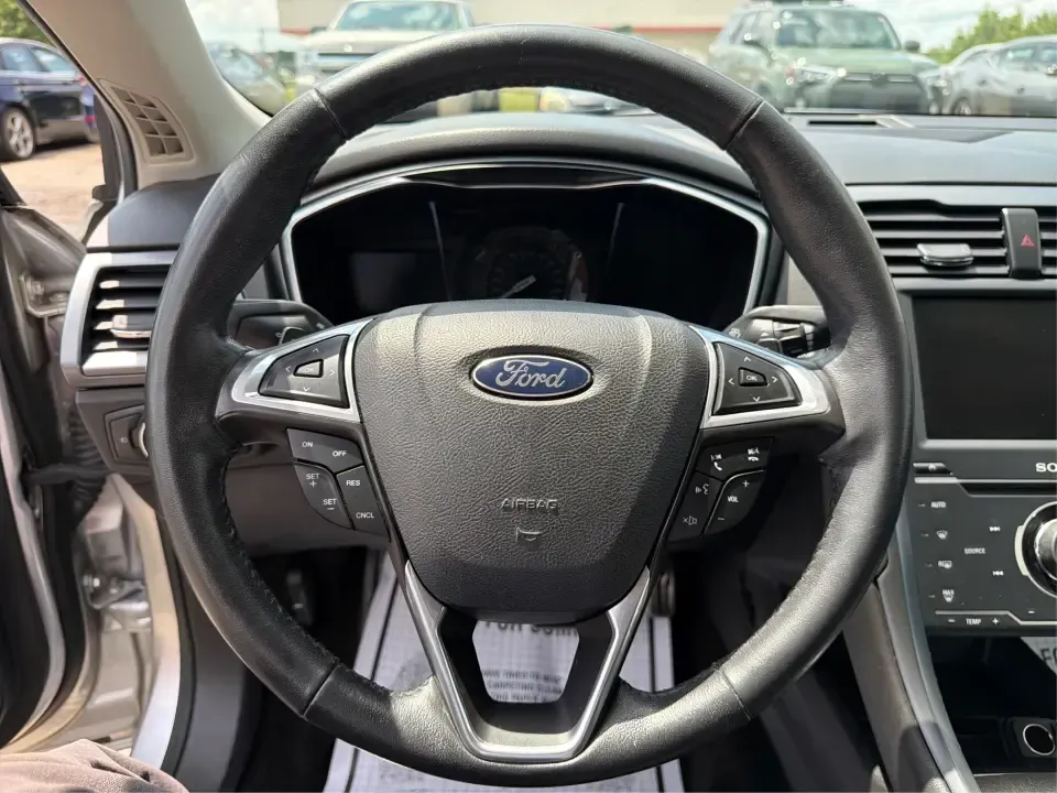 2014 Ford Fusion Titanium AWD (3FA6P0D98ER) with an 2.0L L4 DOHC 16V engine, located at 1099 N County Rd 25A, Troy, OH, 45373, (937) 908-9800, 40.057079, -84.212883 - Need a smart, comfortable sedan that can handle Ohio's changing weather for daily commuting, school drop-offs, and weekend getaways? This 2014 Ford Fusion Titanium AWD is built for real life in and around Troy-whether you're cruising down I75 to Dayton, heading across town on N County Rd 25A, or pla- Photo#16
