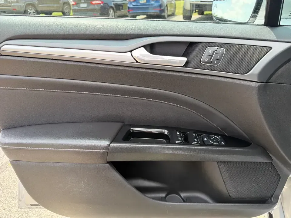 2014 Ford Fusion Titanium AWD (3FA6P0D98ER) with an 2.0L L4 DOHC 16V engine, located at 1099 N County Rd 25A, Troy, OH, 45373, (937) 908-9800, 40.057079, -84.212883 - Need a smart, comfortable sedan that can handle Ohio's changing weather for daily commuting, school drop-offs, and weekend getaways? This 2014 Ford Fusion Titanium AWD is built for real life in and around Troy-whether you're cruising down I75 to Dayton, heading across town on N County Rd 25A, or pla- Photo#19