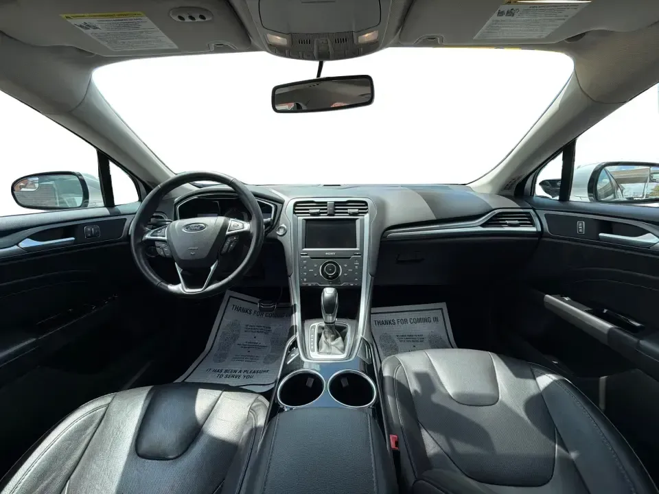 2014 Ford Fusion Titanium AWD (3FA6P0D98ER) with an 2.0L L4 DOHC 16V engine, located at 1099 N County Rd 25A, Troy, OH, 45373, (937) 908-9800, 40.057079, -84.212883 - Need a smart, comfortable sedan that can handle Ohio's changing weather for daily commuting, school drop-offs, and weekend getaways? This 2014 Ford Fusion Titanium AWD is built for real life in and around Troy-whether you're cruising down I75 to Dayton, heading across town on N County Rd 25A, or pla- Photo#21