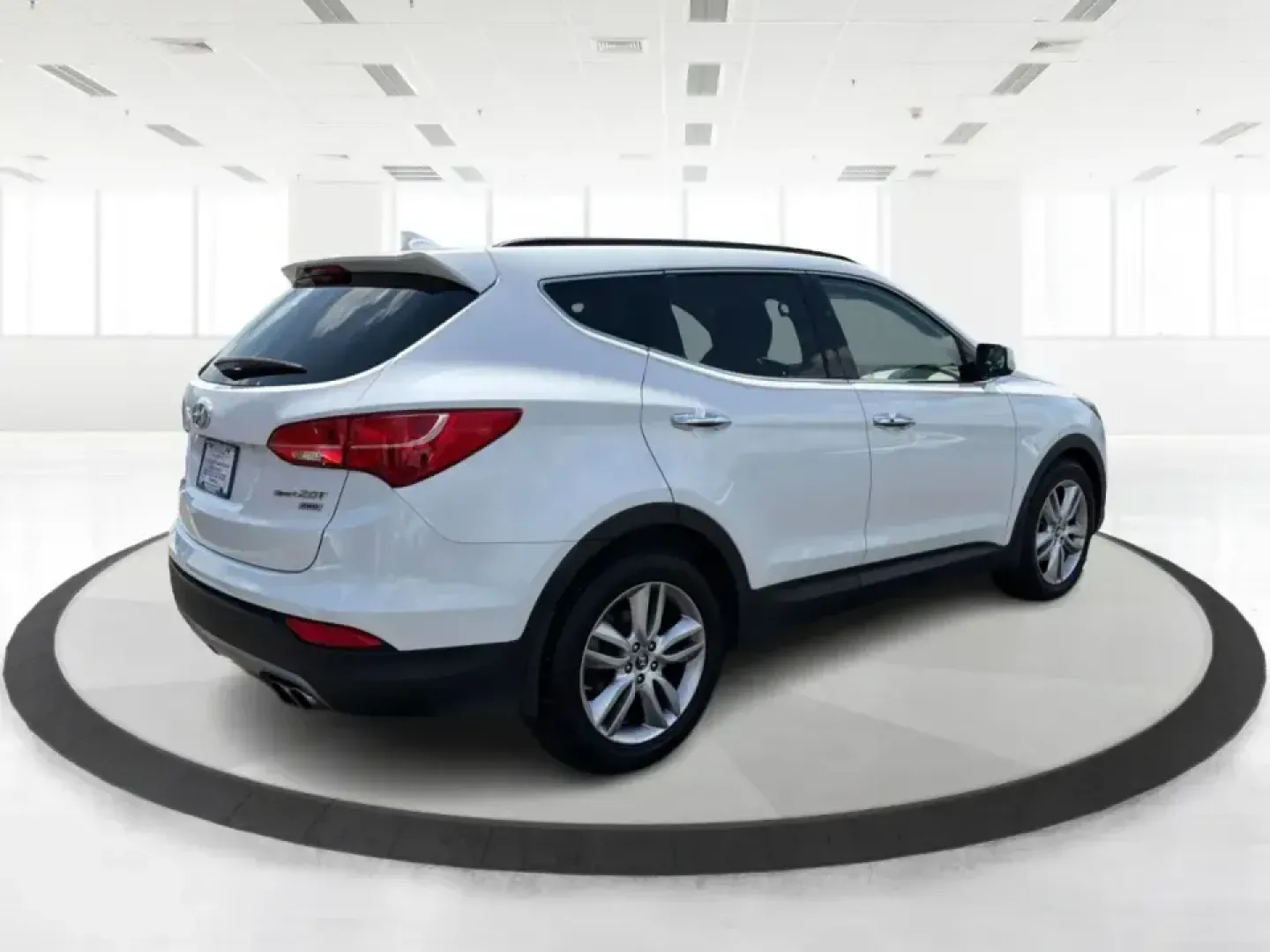 2014 Hyundai Santa Fe Sport 2.0T AWD (5XYZUDLA1EG) with an 2.0L L4 DOHC 16V TURBO engine, 6-Speed Automatic transmission, located at 1230 East Main St, Xenia, OH, 45385, (937) 908-9800, 39.688026, -83.910172 - When your week looks like school drop-offs, a long commute down US-35, and a weekend escape to John Bryan State Park or a soccer tournament near Shawnee Park, you need an SUV that can flex with real life. This 2014 Hyundai Santa Fe Sport 2.0T AWD is built for busy families, outdoorsy couples, and bu- Photo#2