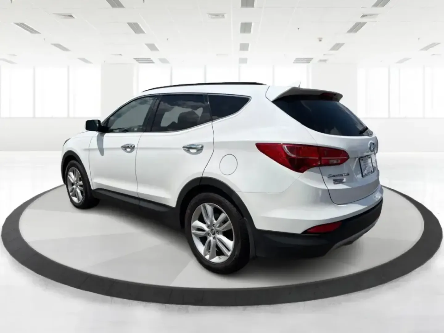 2014 Hyundai Santa Fe Sport 2.0T AWD (5XYZUDLA1EG) with an 2.0L L4 DOHC 16V TURBO engine, 6-Speed Automatic transmission, located at 1230 East Main St, Xenia, OH, 45385, (937) 908-9800, 39.688026, -83.910172 - When your week looks like school drop-offs, a long commute down US-35, and a weekend escape to John Bryan State Park or a soccer tournament near Shawnee Park, you need an SUV that can flex with real life. This 2014 Hyundai Santa Fe Sport 2.0T AWD is built for busy families, outdoorsy couples, and bu- Photo#4