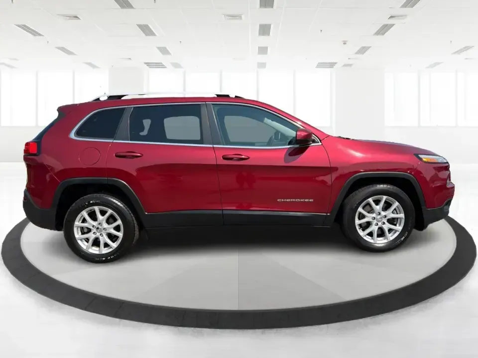2017 Jeep Cherokee Latitude (1C4PJLCB5HW) with an 2.4L L4 DOHC 16V engine, 9-Speed Automatic transmission, located at 401 Woodman Dr, Riverside, OH, 45431, (937) 908-9800, 39.760899, -84.123421 - Need a crossover that fits real life in the Miami Valley-school drop-offs, I675 commutes, grocery runs, and the occasional weekend escape to Carillon Historical Park or a hike near the Mad River? This 2017 Jeep Cherokee Latitude FWD in Deep Cherry Red Crystal Pearlcoat is built for everyday versatil- Photo#1