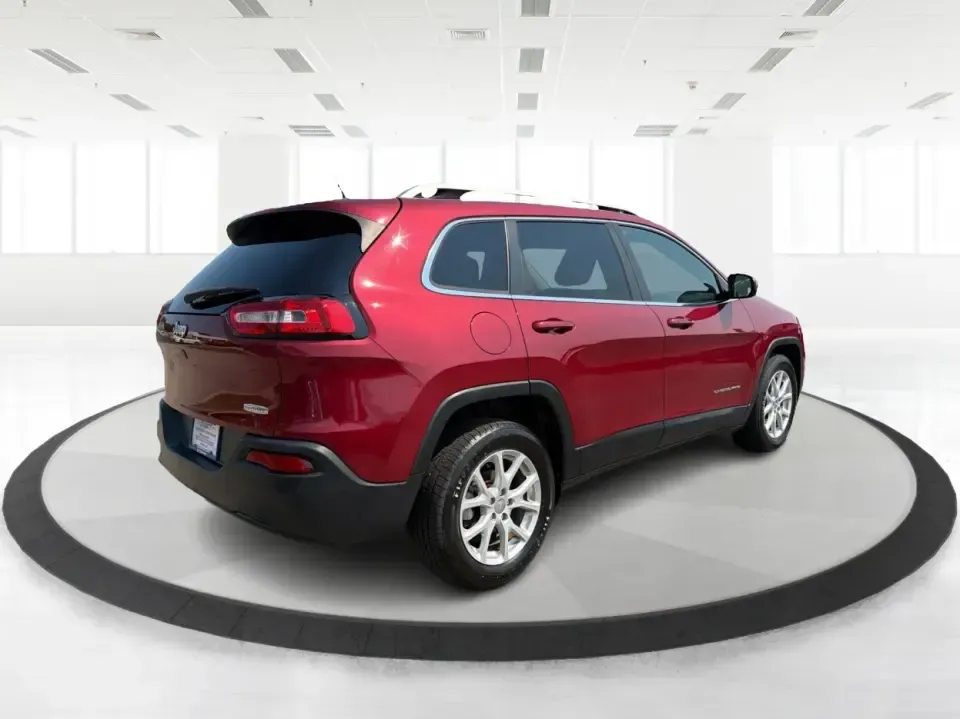 2017 Jeep Cherokee Latitude (1C4PJLCB5HW) with an 2.4L L4 DOHC 16V engine, 9-Speed Automatic transmission, located at 401 Woodman Dr, Riverside, OH, 45431, (937) 908-9800, 39.760899, -84.123421 - Need a crossover that fits real life in the Miami Valley-school drop-offs, I675 commutes, grocery runs, and the occasional weekend escape to Carillon Historical Park or a hike near the Mad River? This 2017 Jeep Cherokee Latitude FWD in Deep Cherry Red Crystal Pearlcoat is built for everyday versatil- Photo#2