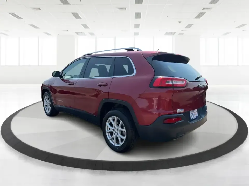 2017 Jeep Cherokee Latitude (1C4PJLCB5HW) with an 2.4L L4 DOHC 16V engine, 9-Speed Automatic transmission, located at 401 Woodman Dr, Riverside, OH, 45431, (937) 908-9800, 39.760899, -84.123421 - Need a crossover that fits real life in the Miami Valley-school drop-offs, I675 commutes, grocery runs, and the occasional weekend escape to Carillon Historical Park or a hike near the Mad River? This 2017 Jeep Cherokee Latitude FWD in Deep Cherry Red Crystal Pearlcoat is built for everyday versatil- Photo#4