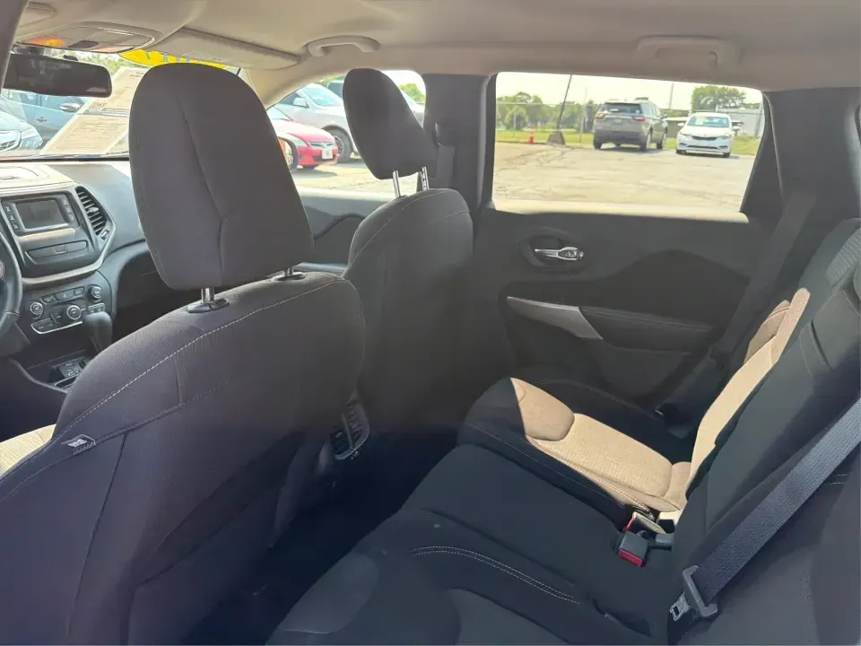 2017 Jeep Cherokee Latitude (1C4PJLCB5HW) with an 2.4L L4 DOHC 16V engine, 9-Speed Automatic transmission, located at 401 Woodman Dr, Riverside, OH, 45431, (937) 908-9800, 39.760899, -84.123421 - Need a crossover that fits real life in the Miami Valley-school drop-offs, I675 commutes, grocery runs, and the occasional weekend escape to Carillon Historical Park or a hike near the Mad River? This 2017 Jeep Cherokee Latitude FWD in Deep Cherry Red Crystal Pearlcoat is built for everyday versatil- Photo#10