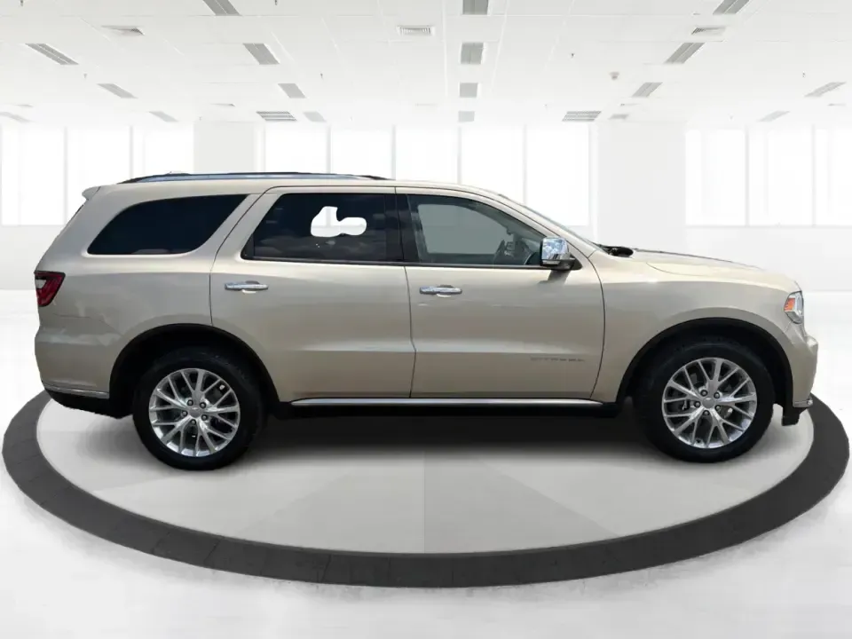2014 Dodge Durango Citadel (1C4RDJEG2EC) with an 3.6L V6 DOHC 24V engine, 8-Speed Automatic transmission, located at 401 Woodman Dr, Riverside, OH, 45431, (937) 908-9800, 39.760899, -84.123421 - Make every day feel easier-whether you're loading up the kids for school in Riverside, planning a weekend getaway to Caesar Creek, or tackling winter weather on I675. This 2014 Dodge Durango Citadel AWD is the kind of three-row SUV that fits real life: roomy for growing families, confident for long- Photo#1