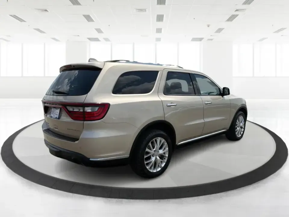 2014 Dodge Durango Citadel (1C4RDJEG2EC) with an 3.6L V6 DOHC 24V engine, 8-Speed Automatic transmission, located at 401 Woodman Dr, Riverside, OH, 45431, (937) 908-9800, 39.760899, -84.123421 - Make every day feel easier-whether you're loading up the kids for school in Riverside, planning a weekend getaway to Caesar Creek, or tackling winter weather on I675. This 2014 Dodge Durango Citadel AWD is the kind of three-row SUV that fits real life: roomy for growing families, confident for long- Photo#2