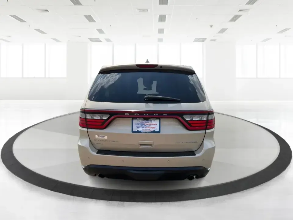 2014 Dodge Durango Citadel (1C4RDJEG2EC) with an 3.6L V6 DOHC 24V engine, 8-Speed Automatic transmission, located at 401 Woodman Dr, Riverside, OH, 45431, (937) 908-9800, 39.760899, -84.123421 - Make every day feel easier-whether you're loading up the kids for school in Riverside, planning a weekend getaway to Caesar Creek, or tackling winter weather on I675. This 2014 Dodge Durango Citadel AWD is the kind of three-row SUV that fits real life: roomy for growing families, confident for long- Photo#3
