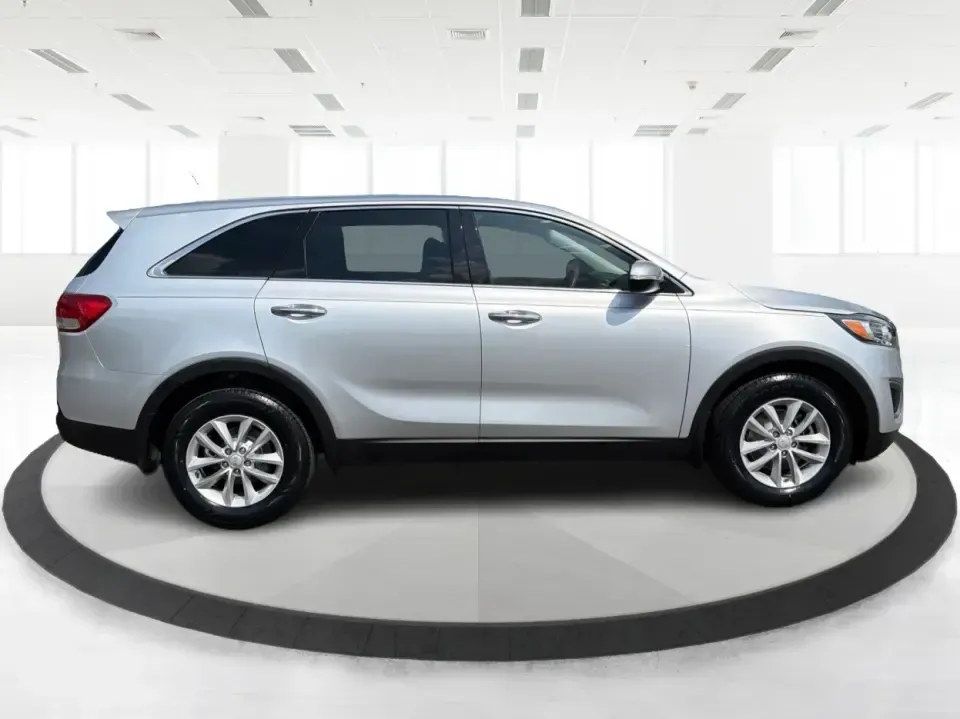 2018 Kia Sorento LX 2WD (5XYPG4A33JG) with an 2.4L L4 DOHC 16V engine, 6-Speed Automatic transmission, located at 1230 East Main St, Xenia, OH, 45385, (937) 908-9800, 39.688026, -83.910172 - Big weekend plans, a busy school schedule, and a daily commute down US-35 all call for one thing: a dependable SUV that fits real life. This 2018 Kia Sorento LX 2WD in Sparkling Silver is a smart pick for Xenia drivers who want comfortable space for passengers and cargo without the bulk of a full-si- Photo#1