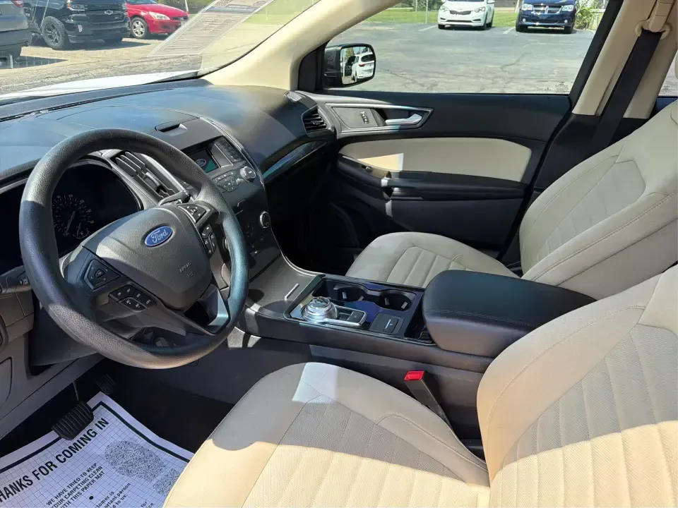 2019 Ford Edge SE FWD (2FMPK3G9XKB) with an 2.0L L4 DOHC 16V engine, 6-Speed Automatic transmission, located at 880 E. National Road, Vandalia, OH, 45377, (937) 908-9800, 39.891918, -84.183594 - Need a practical SUV that fits real life in the Miami Valley-school drop-offs, I75 commutes, and weekend runs to the Dayton Art Institute or the National Museum of the U.S. Air Force? This 2019 Ford Edge SE FWD is built for everyday comfort with the space and tech that make family errands and road t- Photo#9