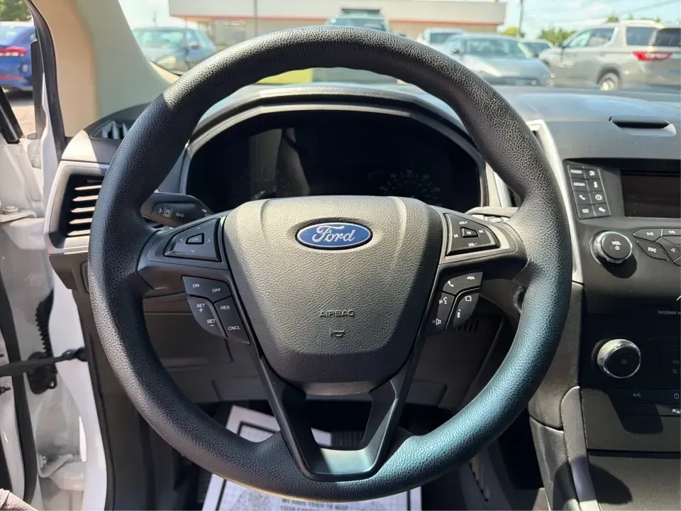 2019 Ford Edge SE FWD (2FMPK3G9XKB) with an 2.0L L4 DOHC 16V engine, 6-Speed Automatic transmission, located at 880 E. National Road, Vandalia, OH, 45377, (937) 908-9800, 39.891918, -84.183594 - Need a practical SUV that fits real life in the Miami Valley-school drop-offs, I75 commutes, and weekend runs to the Dayton Art Institute or the National Museum of the U.S. Air Force? This 2019 Ford Edge SE FWD is built for everyday comfort with the space and tech that make family errands and road t- Photo#16