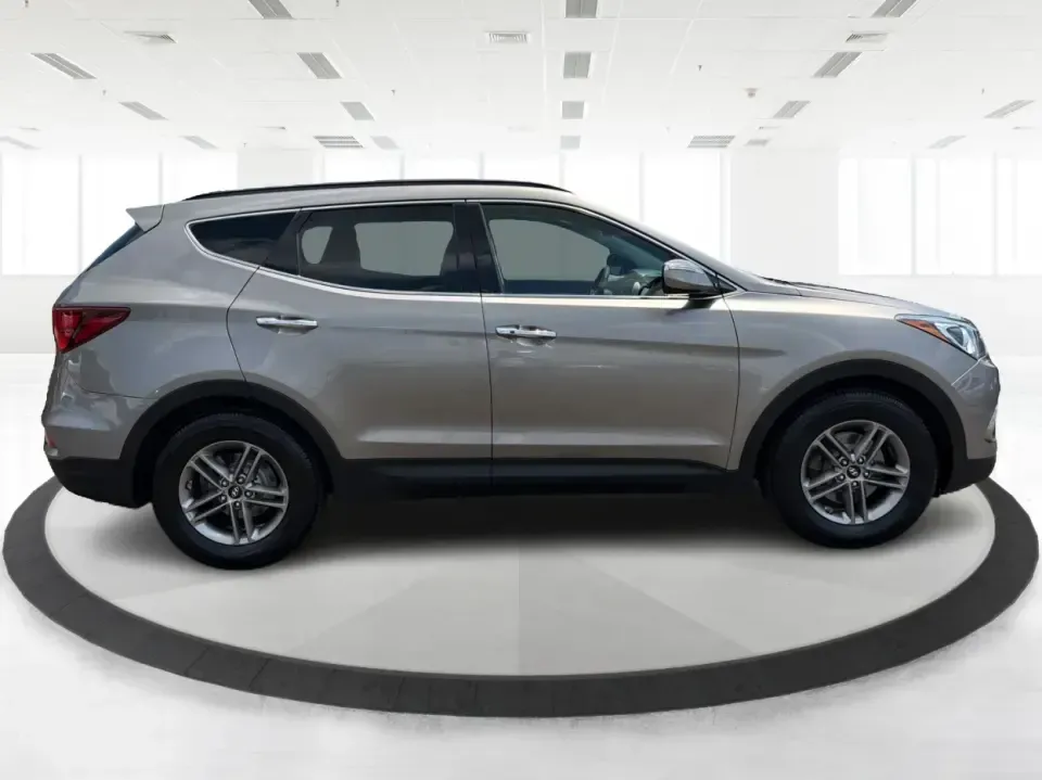 2017 Hyundai Santa Fe Sport 2.4 FWD (5XYZU3LBXHG) with an 2.4L L4 DOHC 16V engine, 6-Speed Automatic transmission, located at 1099 N County Rd 25A, Troy, OH, 45373, (937) 908-9800, 40.057079, -84.212883 - Pack the kids for school drop-off, load up groceries for the week, and still have room for a spontaneous weekend escape-this 2017 Hyundai Santa Fe Sport is built for real life in Troy, Ohio. With SUV practicality, comfortable seating, and the kind of everyday tech that makes commuting smoother, it's- Photo#1