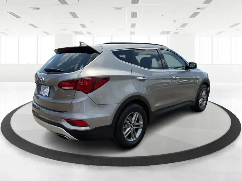 2017 Hyundai Santa Fe Sport 2.4 FWD (5XYZU3LBXHG) with an 2.4L L4 DOHC 16V engine, 6-Speed Automatic transmission, located at 1099 N County Rd 25A, Troy, OH, 45373, (937) 908-9800, 40.057079, -84.212883 - Pack the kids for school drop-off, load up groceries for the week, and still have room for a spontaneous weekend escape-this 2017 Hyundai Santa Fe Sport is built for real life in Troy, Ohio. With SUV practicality, comfortable seating, and the kind of everyday tech that makes commuting smoother, it's- Photo#2