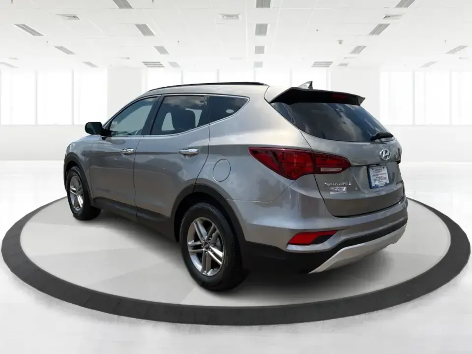 2017 Hyundai Santa Fe Sport 2.4 FWD (5XYZU3LBXHG) with an 2.4L L4 DOHC 16V engine, 6-Speed Automatic transmission, located at 1099 N County Rd 25A, Troy, OH, 45373, (937) 908-9800, 40.057079, -84.212883 - Pack the kids for school drop-off, load up groceries for the week, and still have room for a spontaneous weekend escape-this 2017 Hyundai Santa Fe Sport is built for real life in Troy, Ohio. With SUV practicality, comfortable seating, and the kind of everyday tech that makes commuting smoother, it's- Photo#4