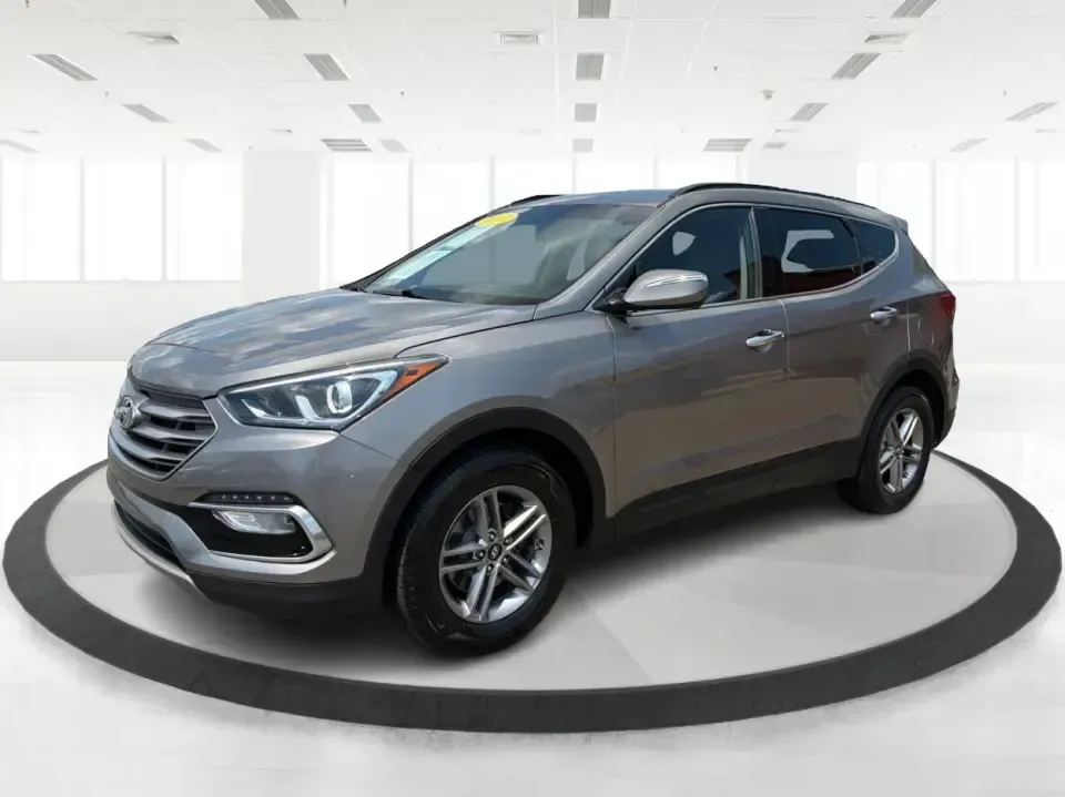 2017 Hyundai Santa Fe Sport 2.4 FWD (5XYZU3LBXHG) with an 2.4L L4 DOHC 16V engine, 6-Speed Automatic transmission, located at 1099 N County Rd 25A, Troy, OH, 45373, (937) 908-9800, 40.057079, -84.212883 - Pack the kids for school drop-off, load up groceries for the week, and still have room for a spontaneous weekend escape-this 2017 Hyundai Santa Fe Sport is built for real life in Troy, Ohio. With SUV practicality, comfortable seating, and the kind of everyday tech that makes commuting smoother, it's- Photo#8