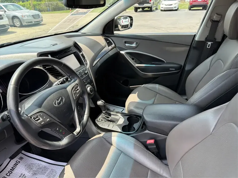 2017 Hyundai Santa Fe Sport 2.4 FWD (5XYZU3LBXHG) with an 2.4L L4 DOHC 16V engine, 6-Speed Automatic transmission, located at 1099 N County Rd 25A, Troy, OH, 45373, (937) 908-9800, 40.057079, -84.212883 - Pack the kids for school drop-off, load up groceries for the week, and still have room for a spontaneous weekend escape-this 2017 Hyundai Santa Fe Sport is built for real life in Troy, Ohio. With SUV practicality, comfortable seating, and the kind of everyday tech that makes commuting smoother, it's- Photo#9