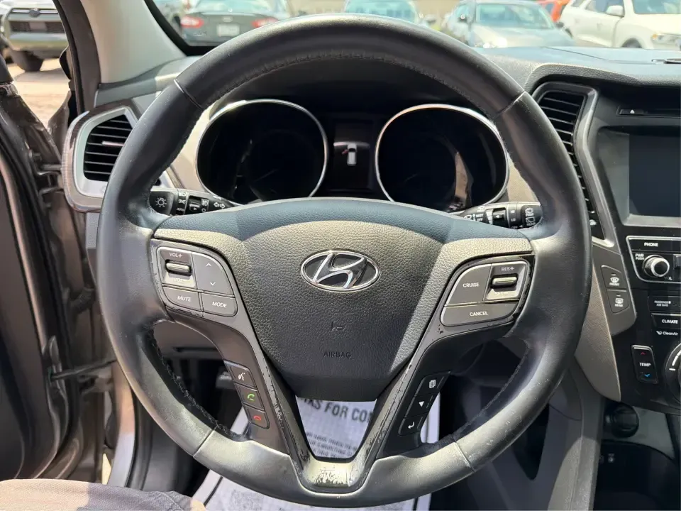 2017 Hyundai Santa Fe Sport 2.4 FWD (5XYZU3LBXHG) with an 2.4L L4 DOHC 16V engine, 6-Speed Automatic transmission, located at 1099 N County Rd 25A, Troy, OH, 45373, (937) 908-9800, 40.057079, -84.212883 - Pack the kids for school drop-off, load up groceries for the week, and still have room for a spontaneous weekend escape-this 2017 Hyundai Santa Fe Sport is built for real life in Troy, Ohio. With SUV practicality, comfortable seating, and the kind of everyday tech that makes commuting smoother, it's- Photo#15
