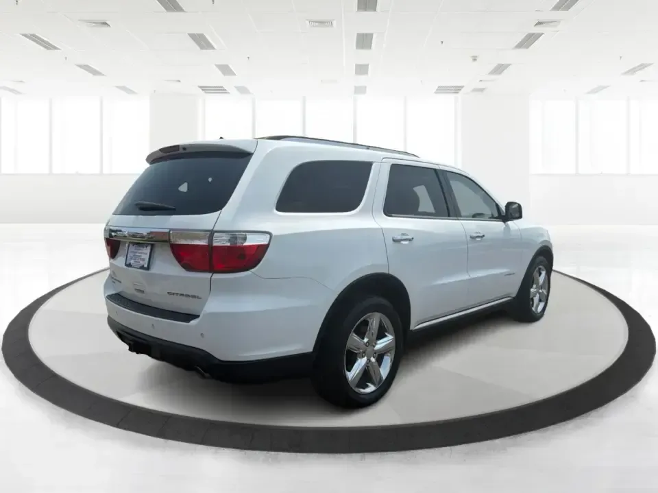 2013 Dodge Durango Citadel (1C4RDJEG0DC) with an 3.6L V6 DOHC 24V engine, 5-Speed Automatic transmission, located at 1184 Kauffman Ave, Fairborn, OH, 45324, (937) 908-9800, 39.807072, -84.030914 - Need one SUV that can handle the weekday school run, a long I675 commute, and a loaded-up weekend to John Bryan State Park? This 2013 Dodge Durango Citadel AWD brings three-row practicality and upscale comfort together in a way that fits real life in Fairborn-whether you're shuttling kids to practic- Photo#2