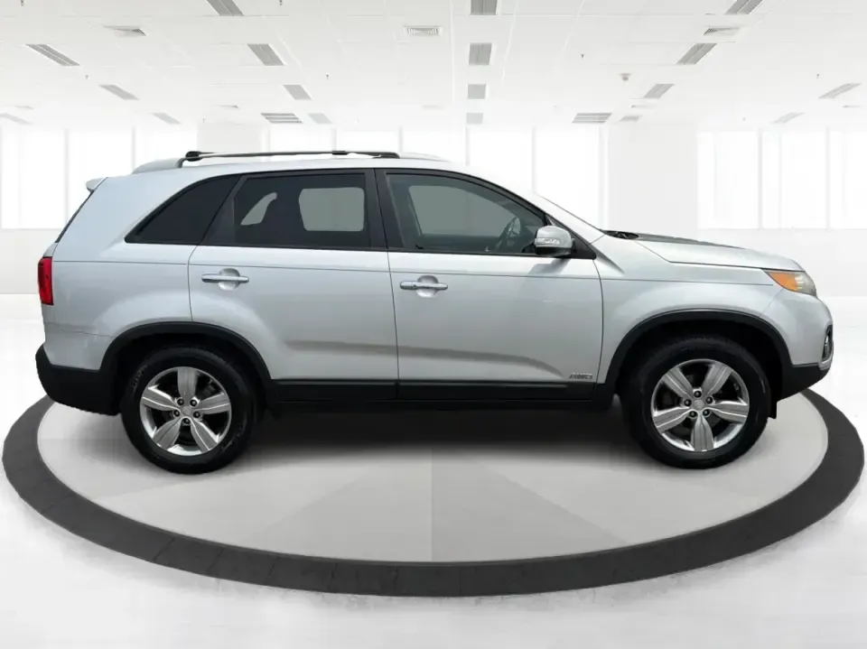 2012 Kia Sorento EX 4WD (5XYKUCA68CG) with an 2.4L L4 DOHC 16V engine, 6-Speed Automatic transmission, located at 1099 N County Rd 25A, Troy, OH, 45373, (937) 908-9800, 40.057079, -84.212883 - Weekend escapes to Caesar Creek, snowy school-drop mornings, and everyday errands up and down I75 feel a lot easier when you've got a comfortable SUV with real all-weather capability. This 2012 Kia Sorento EX 4WD is a smart pick for Troy drivers who want a practical, family-friendly ride that's equa- Photo#1