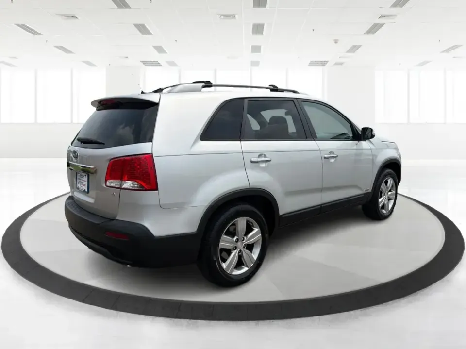 2012 Kia Sorento EX 4WD (5XYKUCA68CG) with an 2.4L L4 DOHC 16V engine, 6-Speed Automatic transmission, located at 1099 N County Rd 25A, Troy, OH, 45373, (937) 908-9800, 40.057079, -84.212883 - Weekend escapes to Caesar Creek, snowy school-drop mornings, and everyday errands up and down I75 feel a lot easier when you've got a comfortable SUV with real all-weather capability. This 2012 Kia Sorento EX 4WD is a smart pick for Troy drivers who want a practical, family-friendly ride that's equa- Photo#2