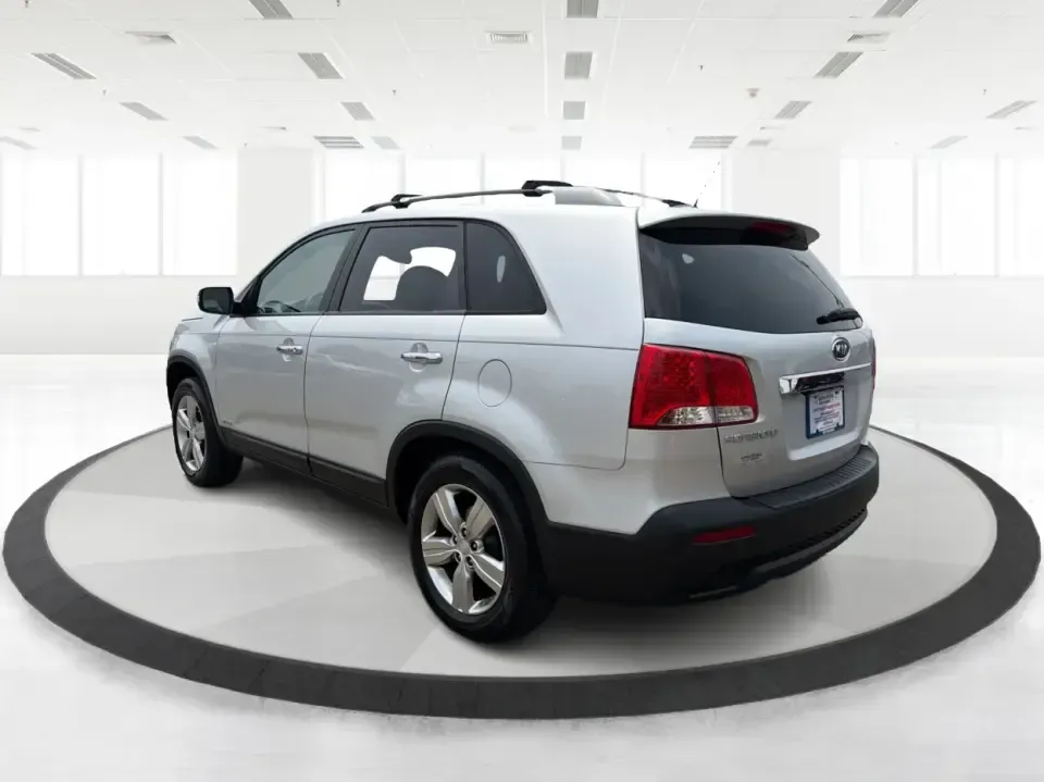 2012 Kia Sorento EX 4WD (5XYKUCA68CG) with an 2.4L L4 DOHC 16V engine, 6-Speed Automatic transmission, located at 1099 N County Rd 25A, Troy, OH, 45373, (937) 908-9800, 40.057079, -84.212883 - Weekend escapes to Caesar Creek, snowy school-drop mornings, and everyday errands up and down I75 feel a lot easier when you've got a comfortable SUV with real all-weather capability. This 2012 Kia Sorento EX 4WD is a smart pick for Troy drivers who want a practical, family-friendly ride that's equa- Photo#4