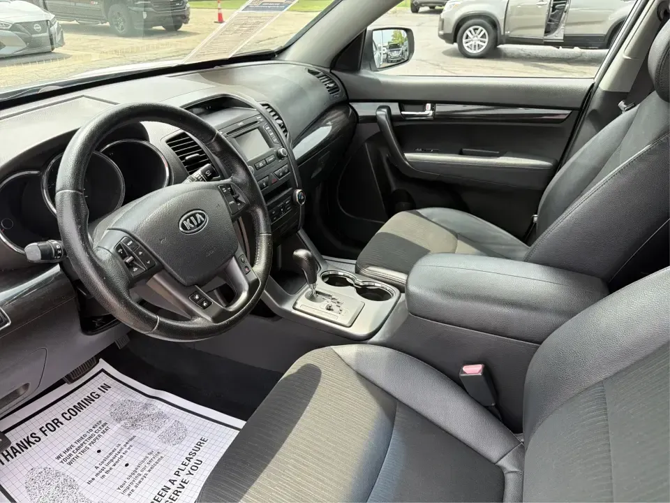 2012 Kia Sorento EX 4WD (5XYKUCA68CG) with an 2.4L L4 DOHC 16V engine, 6-Speed Automatic transmission, located at 1099 N County Rd 25A, Troy, OH, 45373, (937) 908-9800, 40.057079, -84.212883 - Weekend escapes to Caesar Creek, snowy school-drop mornings, and everyday errands up and down I75 feel a lot easier when you've got a comfortable SUV with real all-weather capability. This 2012 Kia Sorento EX 4WD is a smart pick for Troy drivers who want a practical, family-friendly ride that's equa- Photo#9