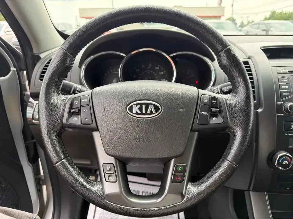2012 Kia Sorento EX 4WD (5XYKUCA68CG) with an 2.4L L4 DOHC 16V engine, 6-Speed Automatic transmission, located at 1099 N County Rd 25A, Troy, OH, 45373, (937) 908-9800, 40.057079, -84.212883 - Weekend escapes to Caesar Creek, snowy school-drop mornings, and everyday errands up and down I75 feel a lot easier when you've got a comfortable SUV with real all-weather capability. This 2012 Kia Sorento EX 4WD is a smart pick for Troy drivers who want a practical, family-friendly ride that's equa- Photo#16