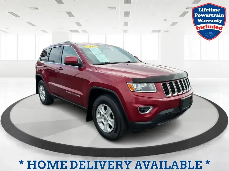 2014 Jeep Grand Cherokee Laredo 4WD (1C4RJFAG9EC) with an 3.6L V6 DOHC 24V engine, 5-Speed Automatic transmission, located at 1099 N County Rd 25A, Troy, OH, 45373, (937) 908-9800, 40.057079, -84.212883 - Picture your next Ohio weekend: the kids and gear loaded up, a cooler in the back, and you cruising out of Troy toward Charleston Falls Preserve or a fall drive through the Miami County countryside-confident that changing weather and back roads won't change your plans. This 2014 Jeep Grand Cherokee- Photo#0