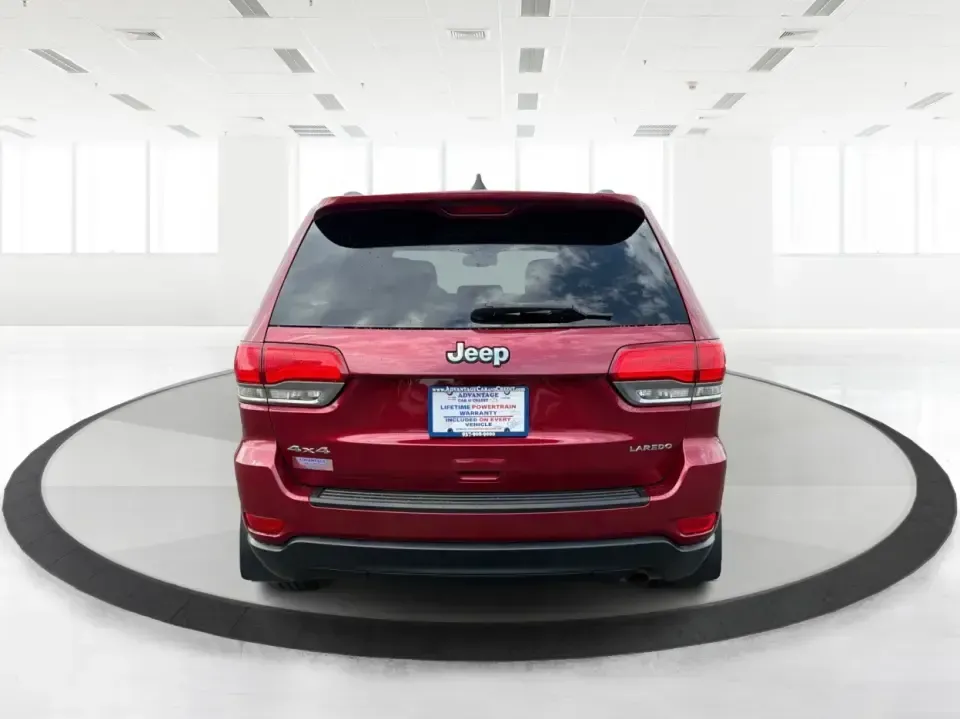2014 Jeep Grand Cherokee Laredo 4WD (1C4RJFAG9EC) with an 3.6L V6 DOHC 24V engine, 5-Speed Automatic transmission, located at 1099 N County Rd 25A, Troy, OH, 45373, (937) 908-9800, 40.057079, -84.212883 - Picture your next Ohio weekend: the kids and gear loaded up, a cooler in the back, and you cruising out of Troy toward Charleston Falls Preserve or a fall drive through the Miami County countryside-confident that changing weather and back roads won't change your plans. This 2014 Jeep Grand Cherokee- Photo#3