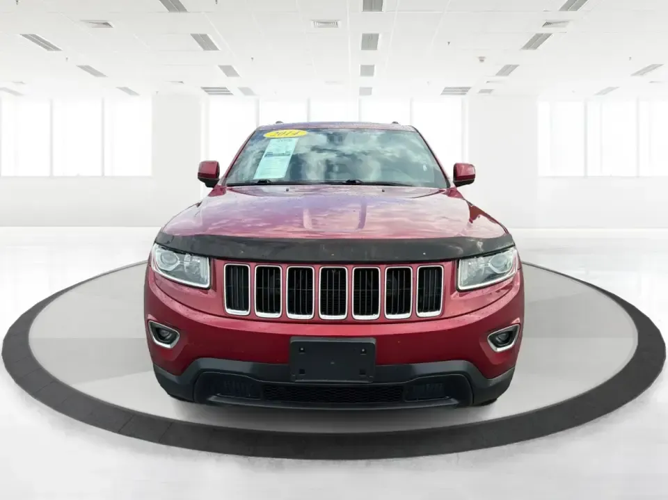 2014 Jeep Grand Cherokee Laredo 4WD (1C4RJFAG9EC) with an 3.6L V6 DOHC 24V engine, 5-Speed Automatic transmission, located at 1099 N County Rd 25A, Troy, OH, 45373, (937) 908-9800, 40.057079, -84.212883 - Picture your next Ohio weekend: the kids and gear loaded up, a cooler in the back, and you cruising out of Troy toward Charleston Falls Preserve or a fall drive through the Miami County countryside-confident that changing weather and back roads won't change your plans. This 2014 Jeep Grand Cherokee- Photo#7