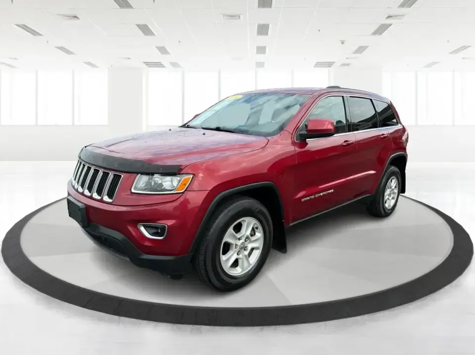 2014 Jeep Grand Cherokee Laredo 4WD (1C4RJFAG9EC) with an 3.6L V6 DOHC 24V engine, 5-Speed Automatic transmission, located at 1099 N County Rd 25A, Troy, OH, 45373, (937) 908-9800, 40.057079, -84.212883 - Picture your next Ohio weekend: the kids and gear loaded up, a cooler in the back, and you cruising out of Troy toward Charleston Falls Preserve or a fall drive through the Miami County countryside-confident that changing weather and back roads won't change your plans. This 2014 Jeep Grand Cherokee- Photo#8