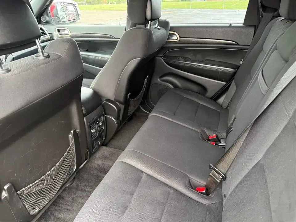 2014 Jeep Grand Cherokee Laredo 4WD (1C4RJFAG9EC) with an 3.6L V6 DOHC 24V engine, 5-Speed Automatic transmission, located at 1099 N County Rd 25A, Troy, OH, 45373, (937) 908-9800, 40.057079, -84.212883 - Picture your next Ohio weekend: the kids and gear loaded up, a cooler in the back, and you cruising out of Troy toward Charleston Falls Preserve or a fall drive through the Miami County countryside-confident that changing weather and back roads won't change your plans. This 2014 Jeep Grand Cherokee- Photo#10