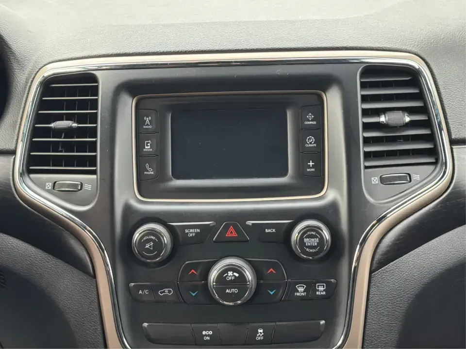 2014 Jeep Grand Cherokee Laredo 4WD (1C4RJFAG9EC) with an 3.6L V6 DOHC 24V engine, 5-Speed Automatic transmission, located at 1099 N County Rd 25A, Troy, OH, 45373, (937) 908-9800, 40.057079, -84.212883 - Picture your next Ohio weekend: the kids and gear loaded up, a cooler in the back, and you cruising out of Troy toward Charleston Falls Preserve or a fall drive through the Miami County countryside-confident that changing weather and back roads won't change your plans. This 2014 Jeep Grand Cherokee- Photo#12