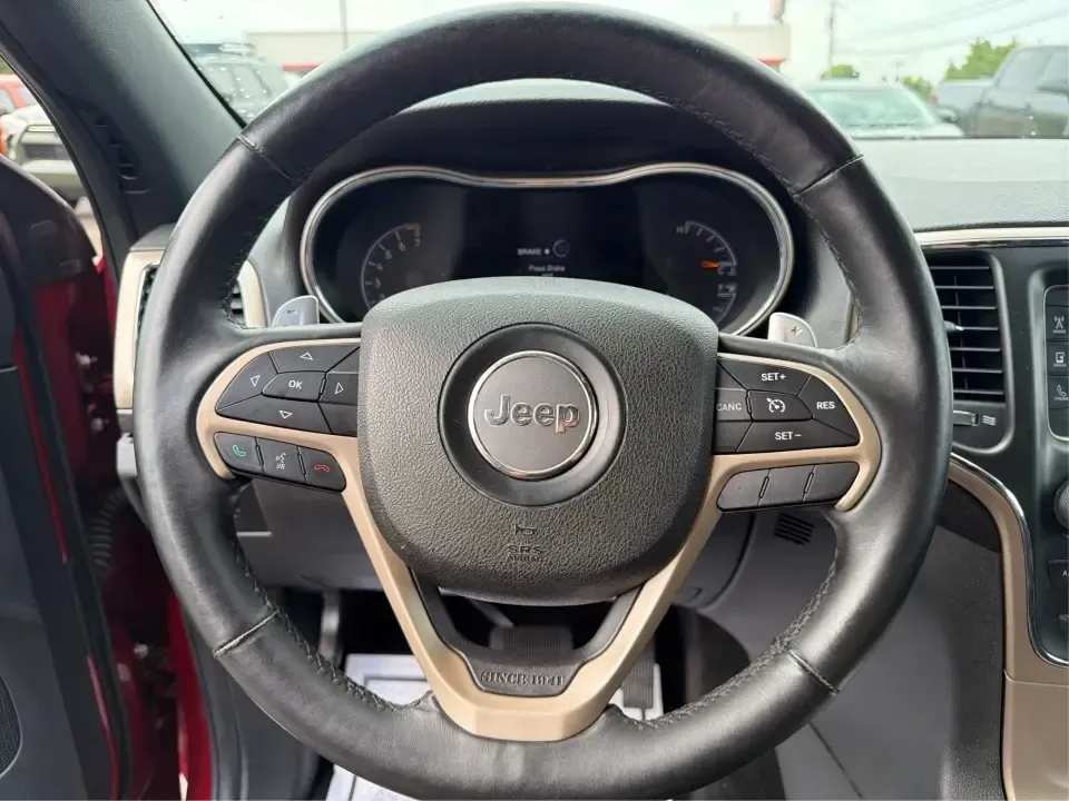 2014 Jeep Grand Cherokee Laredo 4WD (1C4RJFAG9EC) with an 3.6L V6 DOHC 24V engine, 5-Speed Automatic transmission, located at 1099 N County Rd 25A, Troy, OH, 45373, (937) 908-9800, 40.057079, -84.212883 - Picture your next Ohio weekend: the kids and gear loaded up, a cooler in the back, and you cruising out of Troy toward Charleston Falls Preserve or a fall drive through the Miami County countryside-confident that changing weather and back roads won't change your plans. This 2014 Jeep Grand Cherokee- Photo#15