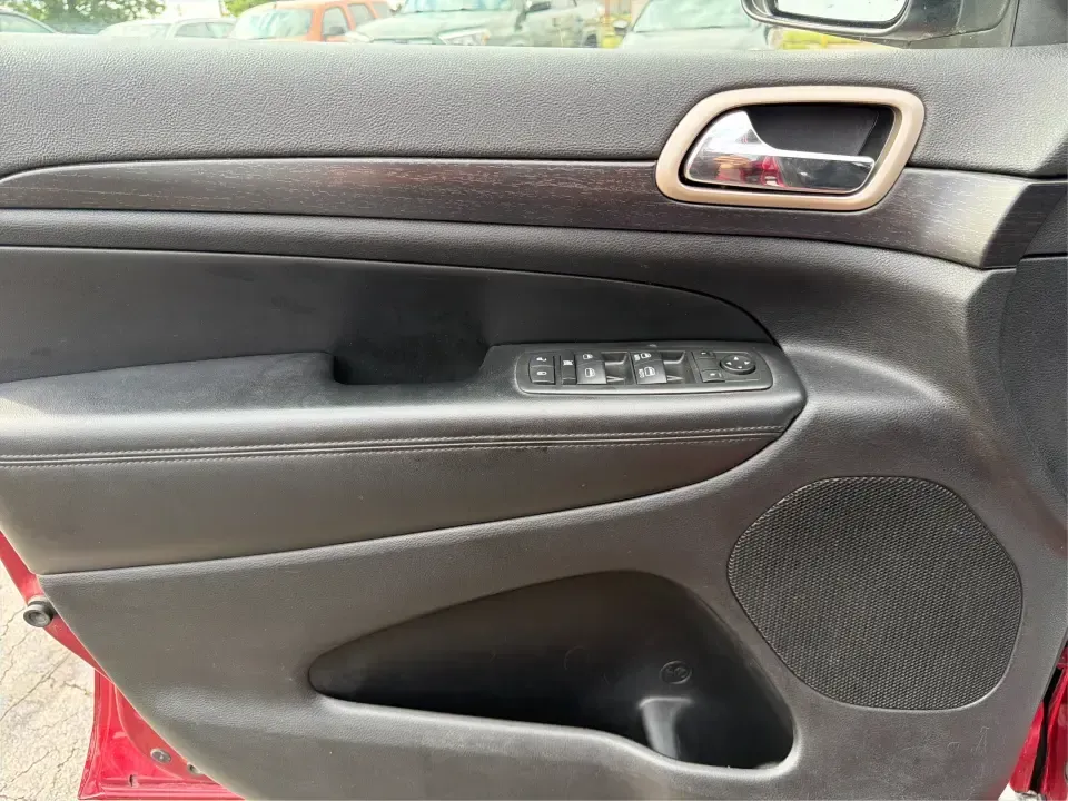 2014 Jeep Grand Cherokee Laredo 4WD (1C4RJFAG9EC) with an 3.6L V6 DOHC 24V engine, 5-Speed Automatic transmission, located at 1099 N County Rd 25A, Troy, OH, 45373, (937) 908-9800, 40.057079, -84.212883 - Picture your next Ohio weekend: the kids and gear loaded up, a cooler in the back, and you cruising out of Troy toward Charleston Falls Preserve or a fall drive through the Miami County countryside-confident that changing weather and back roads won't change your plans. This 2014 Jeep Grand Cherokee- Photo#18