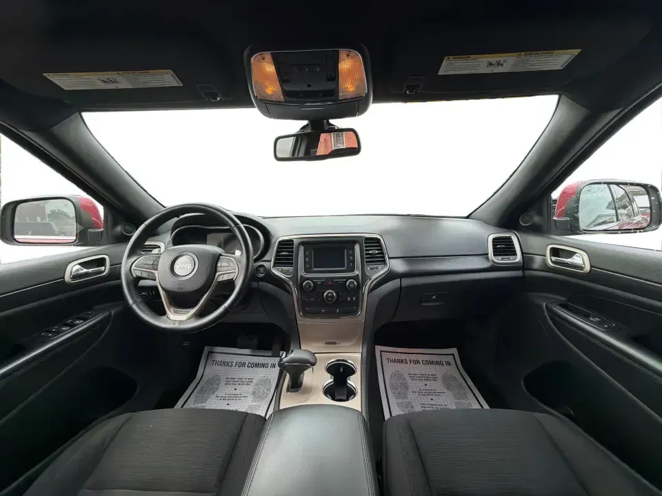 2014 Jeep Grand Cherokee Laredo 4WD (1C4RJFAG9EC) with an 3.6L V6 DOHC 24V engine, 5-Speed Automatic transmission, located at 1099 N County Rd 25A, Troy, OH, 45373, (937) 908-9800, 40.057079, -84.212883 - Picture your next Ohio weekend: the kids and gear loaded up, a cooler in the back, and you cruising out of Troy toward Charleston Falls Preserve or a fall drive through the Miami County countryside-confident that changing weather and back roads won't change your plans. This 2014 Jeep Grand Cherokee- Photo#20