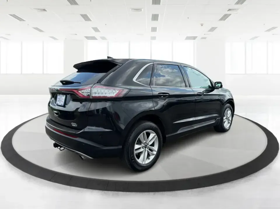 2015 Ford Edge SEL AWD (2FMTK4J92FB) with an 2.0L L4 DOHC 16V engine, 6-Speed Automatic transmission, located at 1230 East Main St, Xenia, OH, 45385, (937) 908-9800, 39.688026, -83.910172 - When your week is packed with school drop-offs, long commutes, and last-minute weekend getaways, you need an SUV that fits real life-comfortable for five, confident in Ohio weather, and ready to haul groceries, sports gear, or luggage without feeling cramped. This 2015 Ford Edge SEL AWD is a smart m- Photo#2