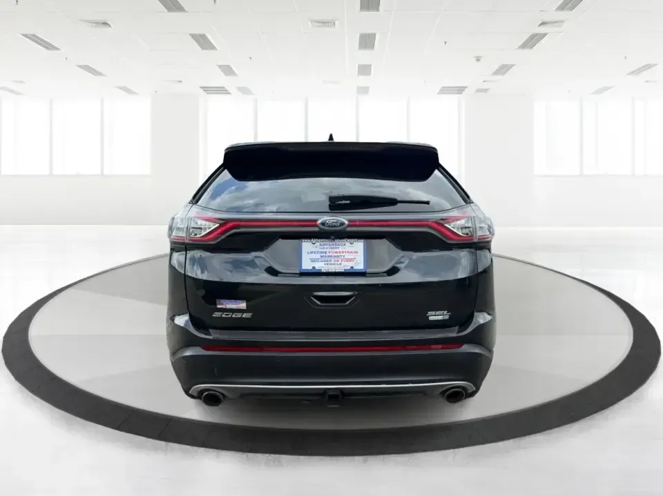 2015 Ford Edge SEL AWD (2FMTK4J92FB) with an 2.0L L4 DOHC 16V engine, 6-Speed Automatic transmission, located at 1230 East Main St, Xenia, OH, 45385, (937) 908-9800, 39.688026, -83.910172 - When your week is packed with school drop-offs, long commutes, and last-minute weekend getaways, you need an SUV that fits real life-comfortable for five, confident in Ohio weather, and ready to haul groceries, sports gear, or luggage without feeling cramped. This 2015 Ford Edge SEL AWD is a smart m- Photo#3