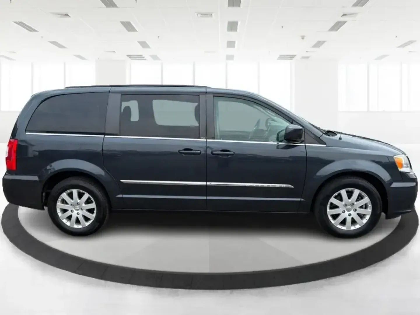 2014 Chrysler Town and Country Touring (2C4RC1BG7ER) with an 3.6L V6 DOHC 24V engine, 6-Speed Automatic transmission, located at 880 E. National Road, Vandalia, OH, 45377, (937) 908-9800, 39.891918, -84.183594 - Whether you're shuttling kids to practice, commuting up and down I-75, or packing up for a weekend at the National Museum of the U.S. Air Force, a minivan that's comfortable, capable, and easy to live with can make every day smoother. This 2014 Chrysler Town and Country Touring is built for real-l- Photo#1