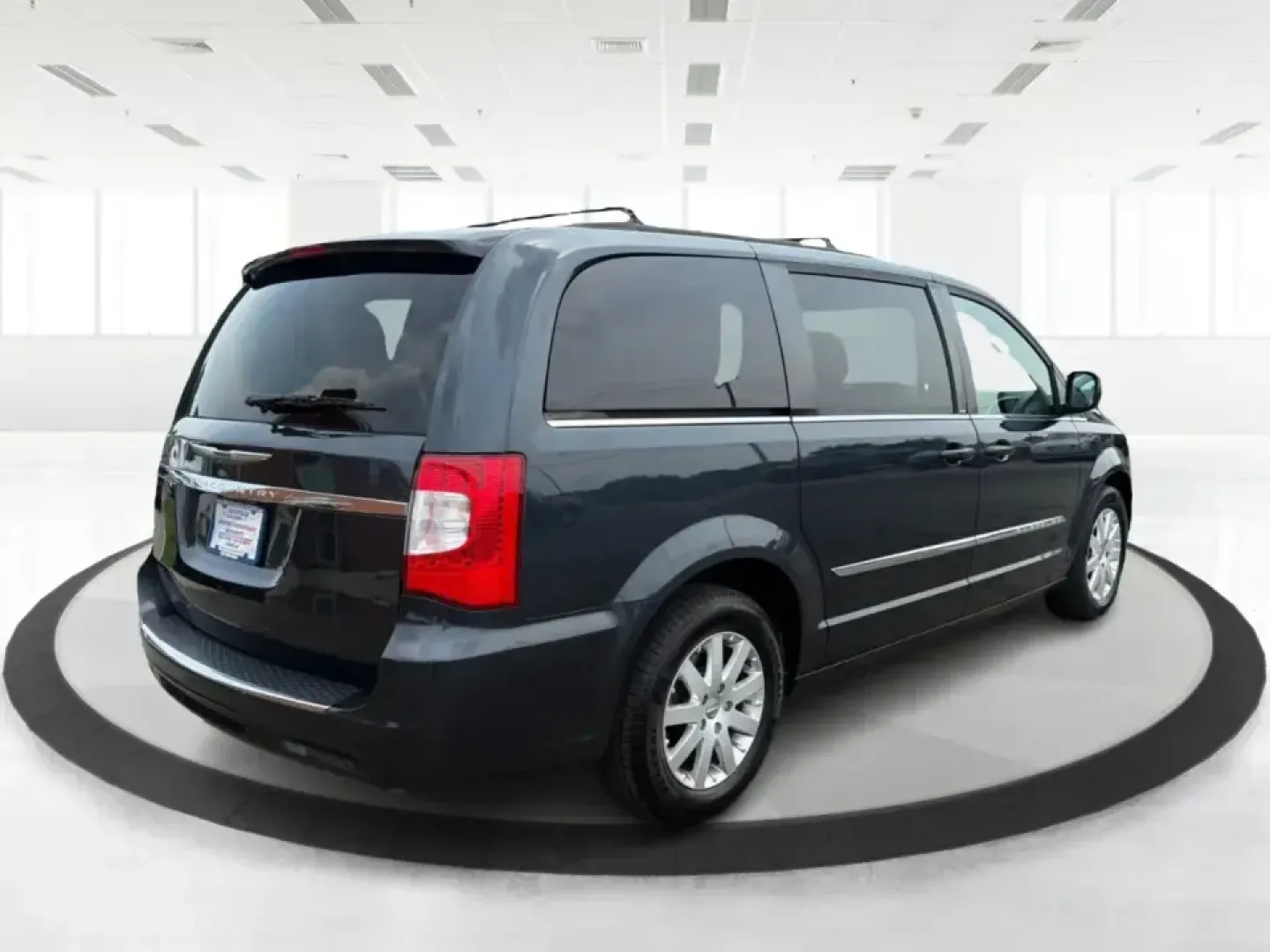 2014 Chrysler Town and Country Touring (2C4RC1BG7ER) with an 3.6L V6 DOHC 24V engine, 6-Speed Automatic transmission, located at 880 E. National Road, Vandalia, OH, 45377, (937) 908-9800, 39.891918, -84.183594 - Whether you're shuttling kids to practice, commuting up and down I-75, or packing up for a weekend at the National Museum of the U.S. Air Force, a minivan that's comfortable, capable, and easy to live with can make every day smoother. This 2014 Chrysler Town and Country Touring is built for real-l- Photo#2