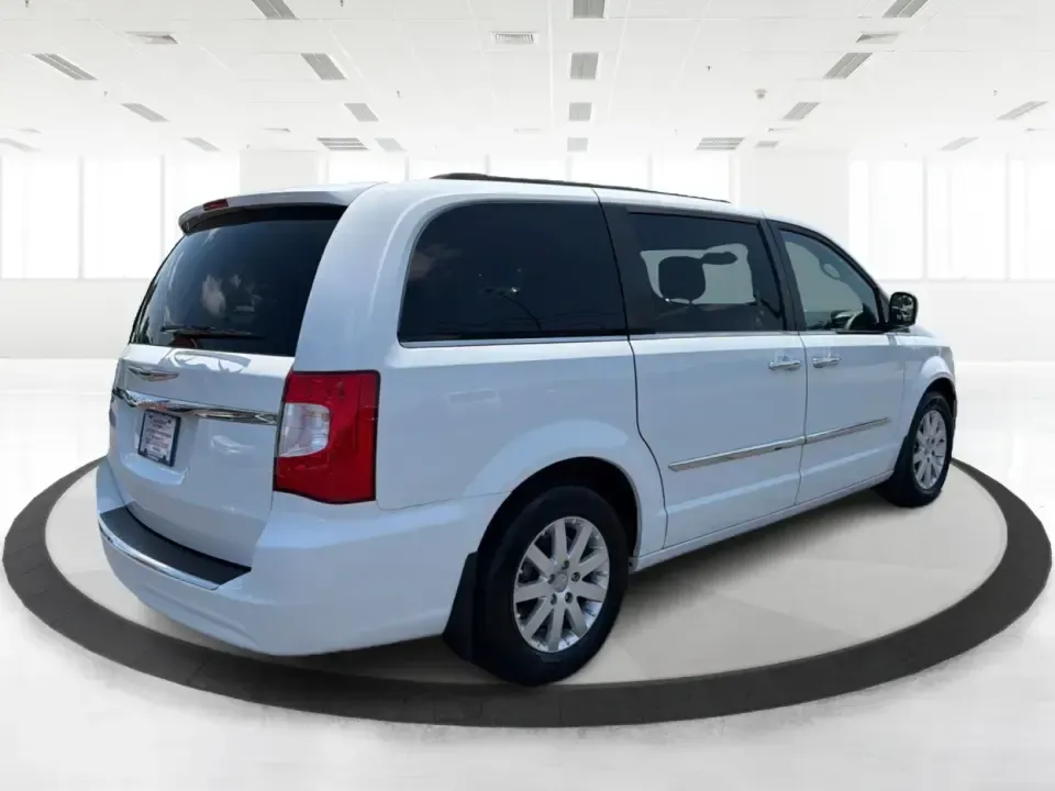 2015 Chrysler Town and Country Touring (2C4RC1BG3FR) with an 3.6L V6 DOHC 24V engine, 6-Speed Automatic transmission, located at 1951 S Dayton Lakeview Rd., New Carlisle, OH, 45344, (937) 908-9800, 39.890999, -84.050255 - Pack the kids, cue up the road-trip playlist, and head from New Carlisle to Dayton or Springfield with room for everyone and everything-this 2015 Chrysler Town and Country Touring is the kind of family-ready van that makes school drop-offs, weekend tournaments, and grocery runs feel simpler. With- Photo#2