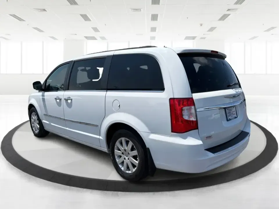 2015 Chrysler Town and Country Touring (2C4RC1BG3FR) with an 3.6L V6 DOHC 24V engine, 6-Speed Automatic transmission, located at 1951 S Dayton Lakeview Rd., New Carlisle, OH, 45344, (937) 908-9800, 39.890999, -84.050255 - Pack the kids, cue up the road-trip playlist, and head from New Carlisle to Dayton or Springfield with room for everyone and everything-this 2015 Chrysler Town and Country Touring is the kind of family-ready van that makes school drop-offs, weekend tournaments, and grocery runs feel simpler. With- Photo#4