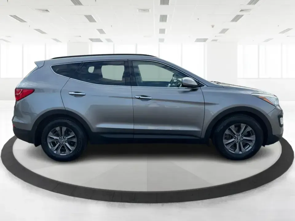 2014 Hyundai Santa Fe Sport 2.4 AWD (5XYZUDLB3EG) with an 2.4L L4 DOHC 16V engine, 6-Speed Automatic transmission, located at 1951 S Dayton Lakeview Rd., New Carlisle, OH, 45344, (937) 908-9800, 39.890999, -84.050255 - Plan your next family road trip, daily commute to Dayton, or weekend escape to Buck Creek State Park in an SUV built to handle Ohio weather and real-life schedules. This 2014 Hyundai Santa Fe Sport 2.4 AWD is a practical, confidence-inspiring choice for drivers who want comfortable seating for five,- Photo#1