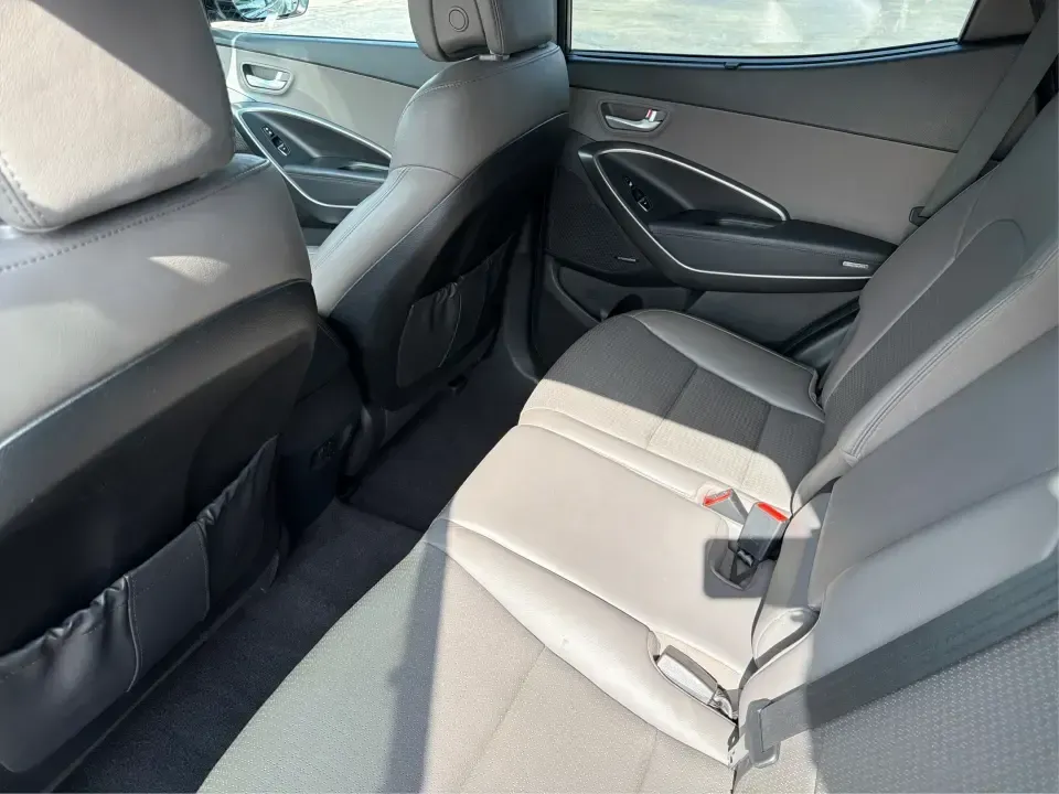 2014 Hyundai Santa Fe Sport 2.4 AWD (5XYZUDLB3EG) with an 2.4L L4 DOHC 16V engine, 6-Speed Automatic transmission, located at 1951 S Dayton Lakeview Rd., New Carlisle, OH, 45344, (937) 908-9800, 39.890999, -84.050255 - Plan your next family road trip, daily commute to Dayton, or weekend escape to Buck Creek State Park in an SUV built to handle Ohio weather and real-life schedules. This 2014 Hyundai Santa Fe Sport 2.4 AWD is a practical, confidence-inspiring choice for drivers who want comfortable seating for five,- Photo#10