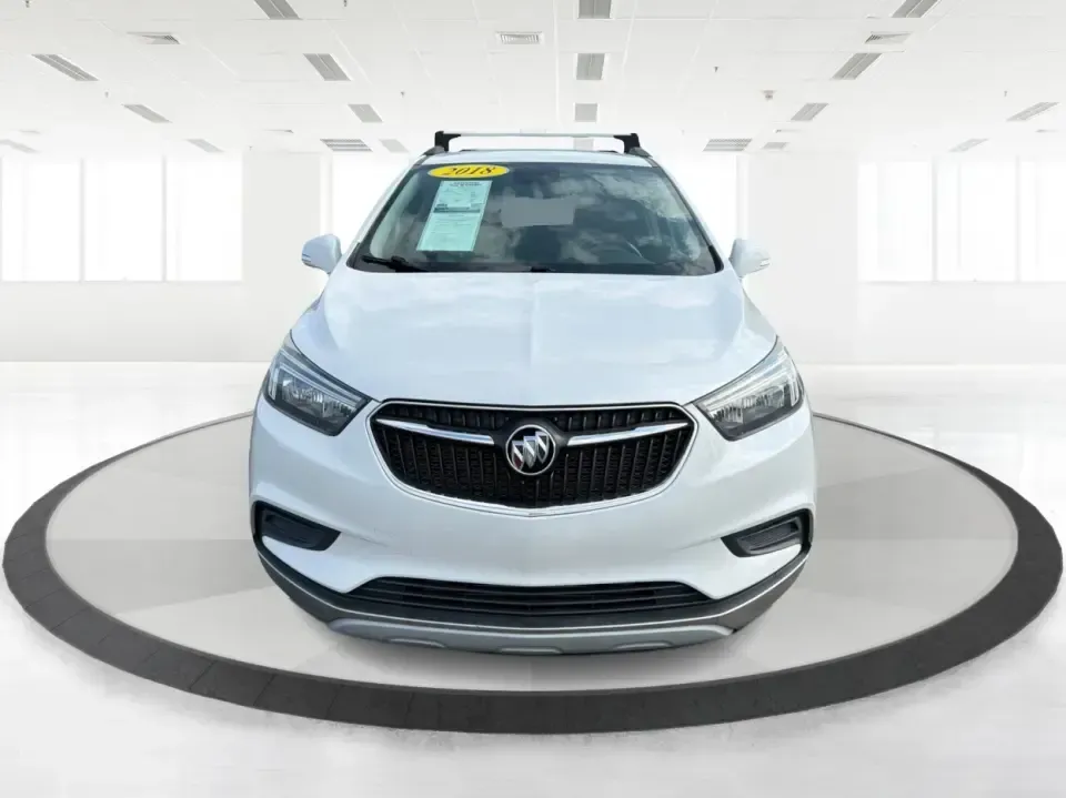2018 Buick Encore Preferred FWD (KL4CJASB1JB) with an 1.4L L4 DOHC 16V TURBO engine, 6-Speed Automatic transmission, located at 8750 N County Rd 25A, Piqua, OH, 45356, (937) 908-9800, 40.164391, -84.232513 - Need a nimble SUV that fits real life in the Miami Valley-school drop-offs, a long commute down I75, and weekend errands without feeling bulky in tight parking lots? This 2018 Buick Encore Preferred FWD in Summit White is a smart pick for busy families, first-time buyers, and budget-conscious driver- Photo#7