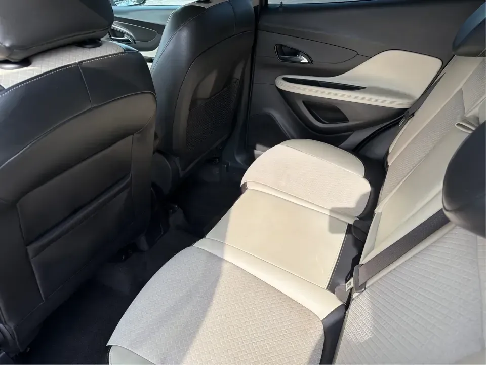 2018 Buick Encore Preferred FWD (KL4CJASB1JB) with an 1.4L L4 DOHC 16V TURBO engine, 6-Speed Automatic transmission, located at 8750 N County Rd 25A, Piqua, OH, 45356, (937) 908-9800, 40.164391, -84.232513 - Need a nimble SUV that fits real life in the Miami Valley-school drop-offs, a long commute down I75, and weekend errands without feeling bulky in tight parking lots? This 2018 Buick Encore Preferred FWD in Summit White is a smart pick for busy families, first-time buyers, and budget-conscious driver- Photo#10