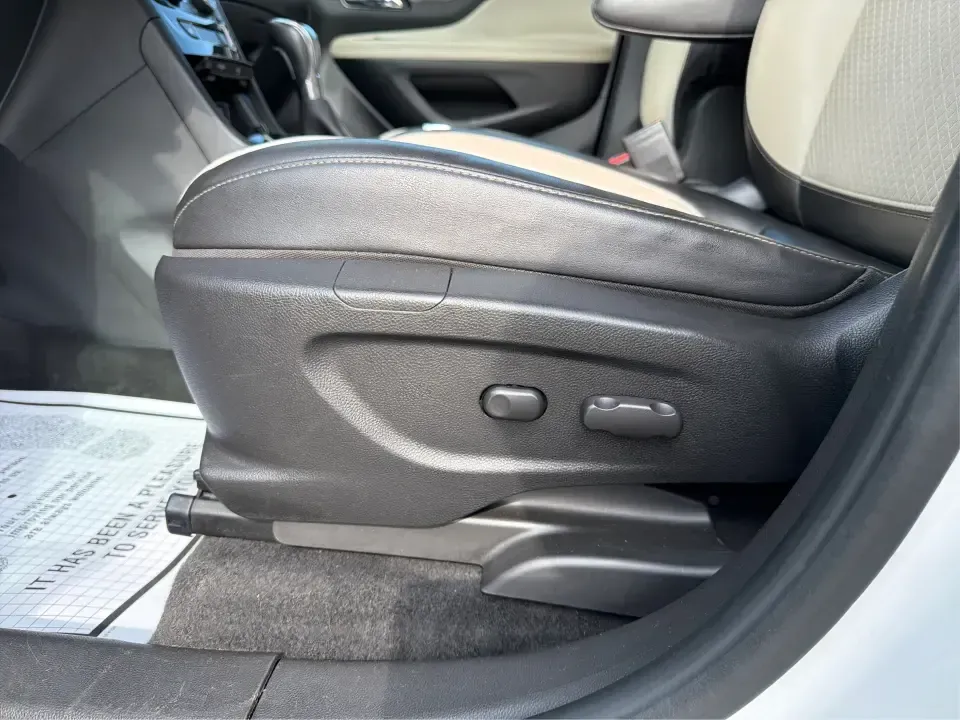 2018 Buick Encore Preferred FWD (KL4CJASB1JB) with an 1.4L L4 DOHC 16V TURBO engine, 6-Speed Automatic transmission, located at 8750 N County Rd 25A, Piqua, OH, 45356, (937) 908-9800, 40.164391, -84.232513 - Need a nimble SUV that fits real life in the Miami Valley-school drop-offs, a long commute down I75, and weekend errands without feeling bulky in tight parking lots? This 2018 Buick Encore Preferred FWD in Summit White is a smart pick for busy families, first-time buyers, and budget-conscious driver- Photo#18