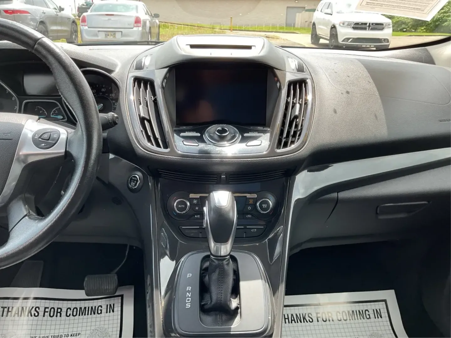 2015 Ford Escape Titanium (1FMCU9J95FU) with an Other engine, located at 1099 N County Rd 25A, Troy, OH, 45373, (937) 908-9800, 40.057079, -84.212883 - Discover your next adventure with the 2015 Ford Escape Titanium, now available at Advantage Car and Credit in Fairborn, OH! Whether you're looking for a family-friendly SUV, a reliable commuter vehicle, or a versatile option for weekend getaways, this Escape checks all the boxes. With a stunning Tux - Photo#12